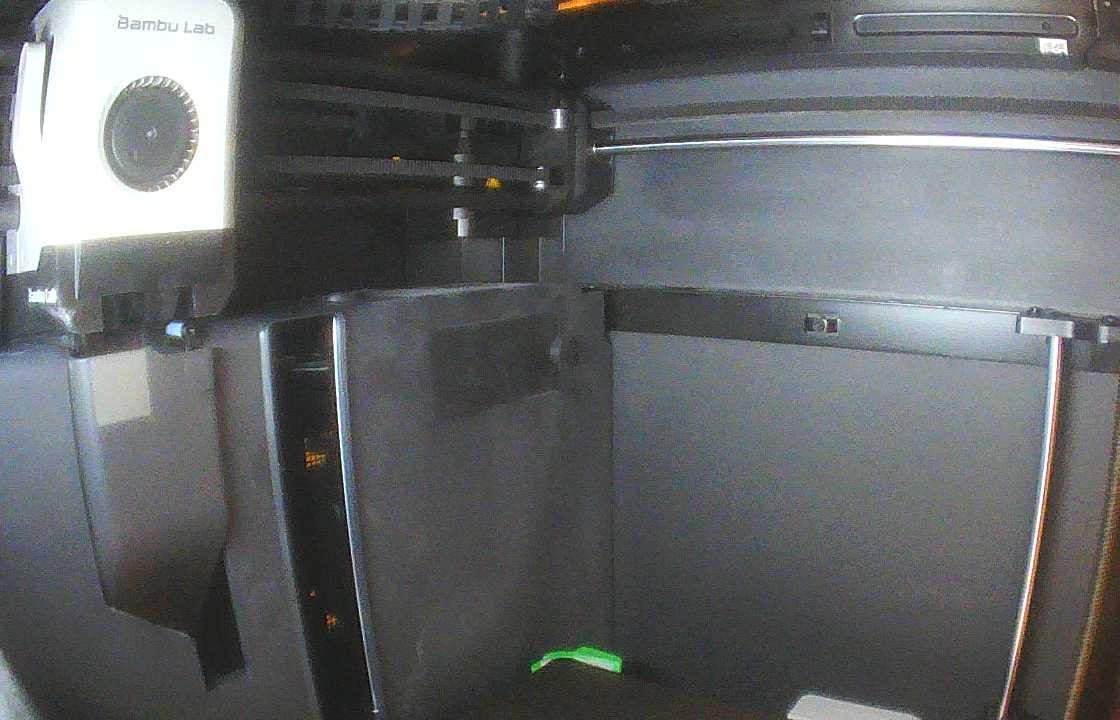 Chamber camera view of the same printer with the print removed and the build plate empty.